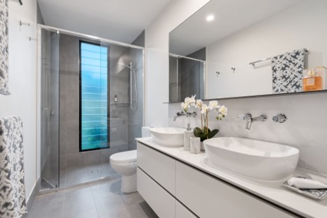 A bathroom with beautiful bathroom tiles in a neutral color scheme