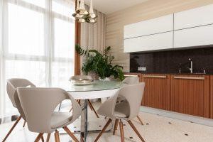 A table with chairs in a brand-new kitchen